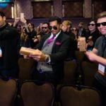 Guys making music at a corporate event