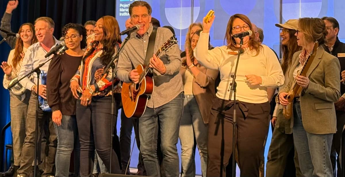 a team building group performing the song they wrote