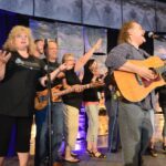 a team building group on stage