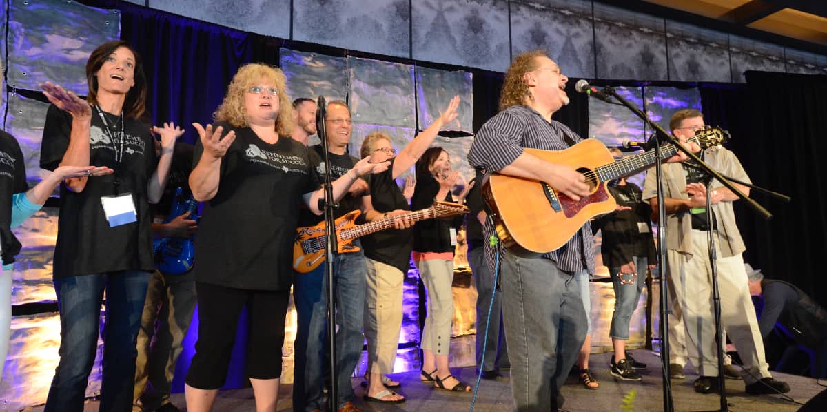 a team building group on stage