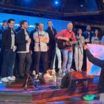 a team building performance on stage in Dallas