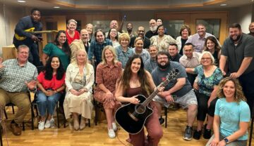 a group performance after incorporating AI into a songwriting program