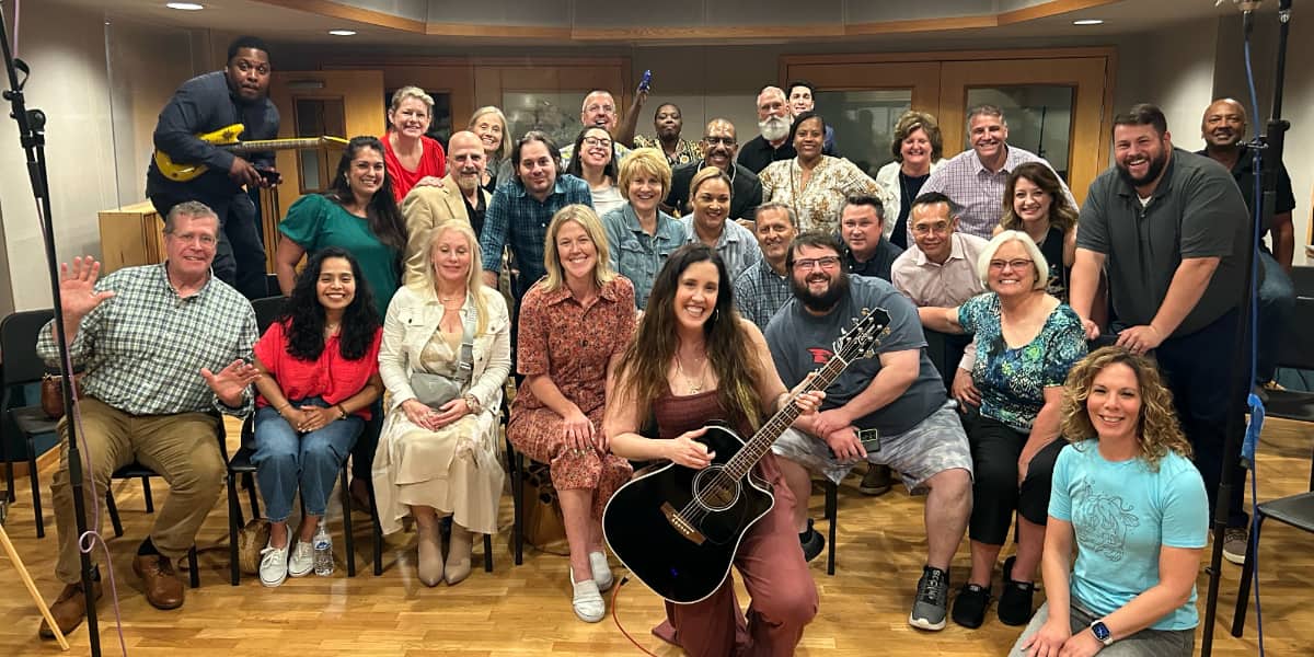 a group performance after incorporating AI into a songwriting program